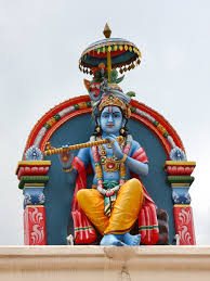 Lord Krishna depicted with blue skin in Hindu tradition